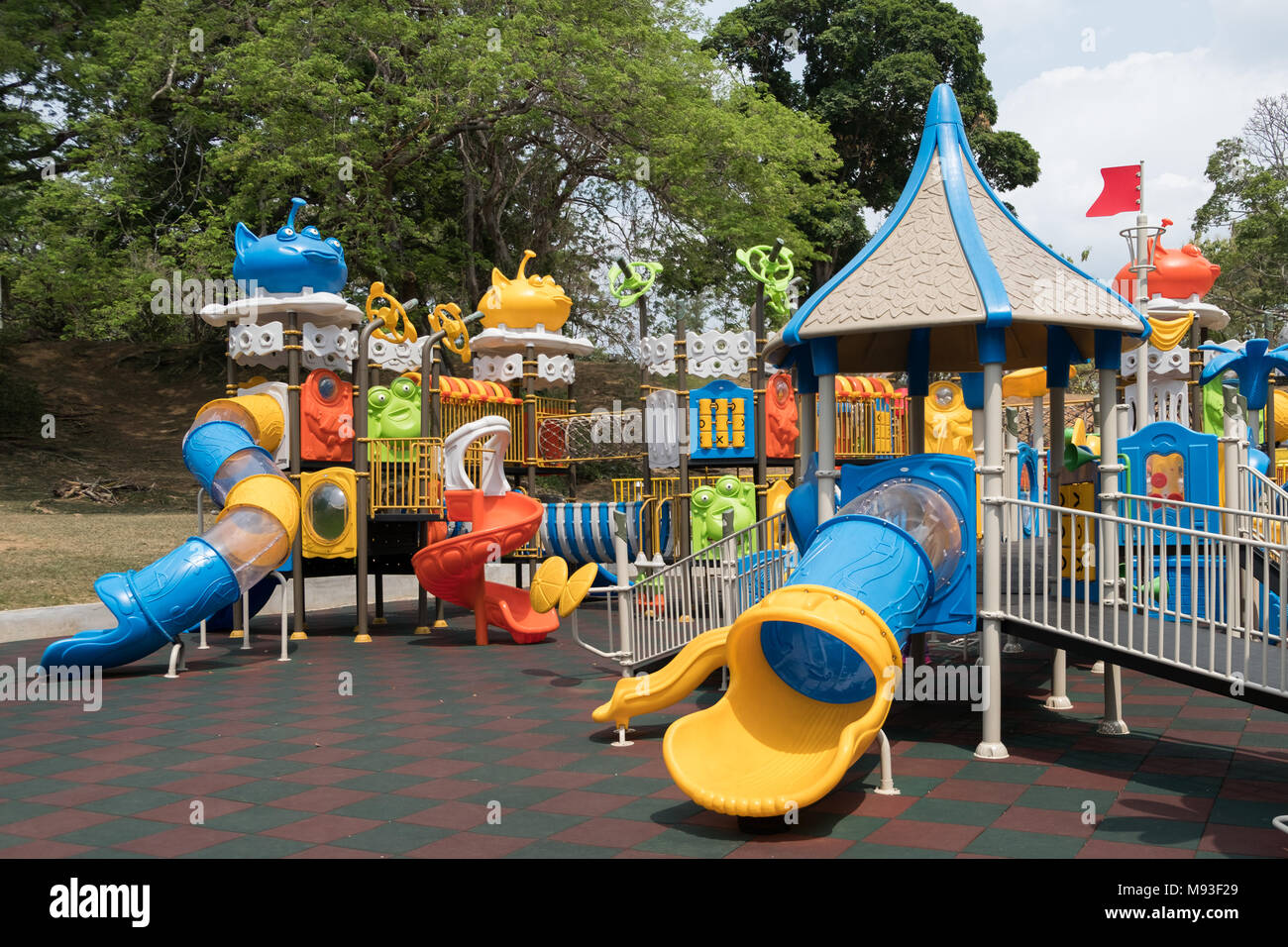 playground castle - new climbing frame  - monkey bars and slides  outdoor park Stock Photo