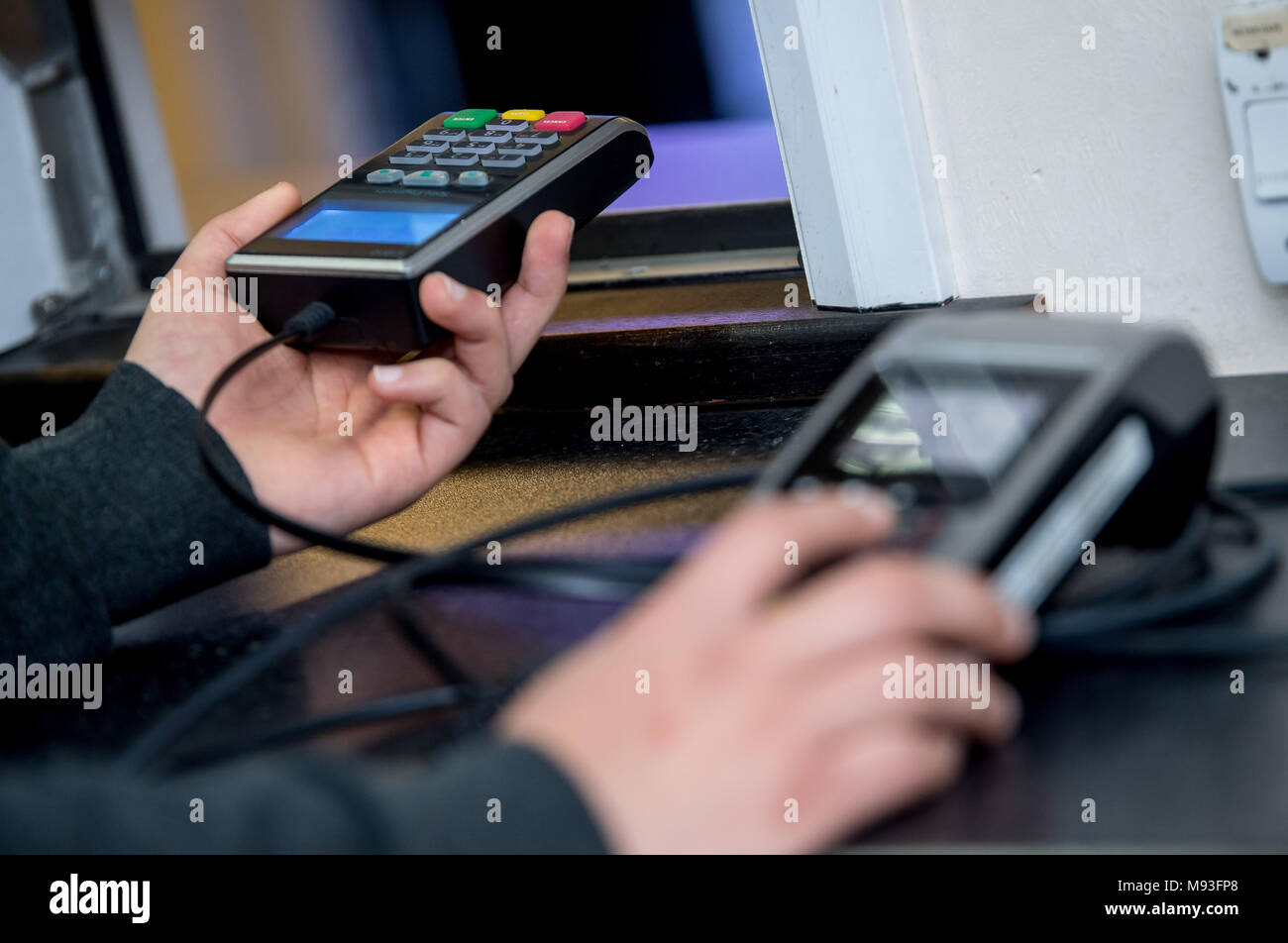 Card machine being used to take payment Stock Photo Alamy