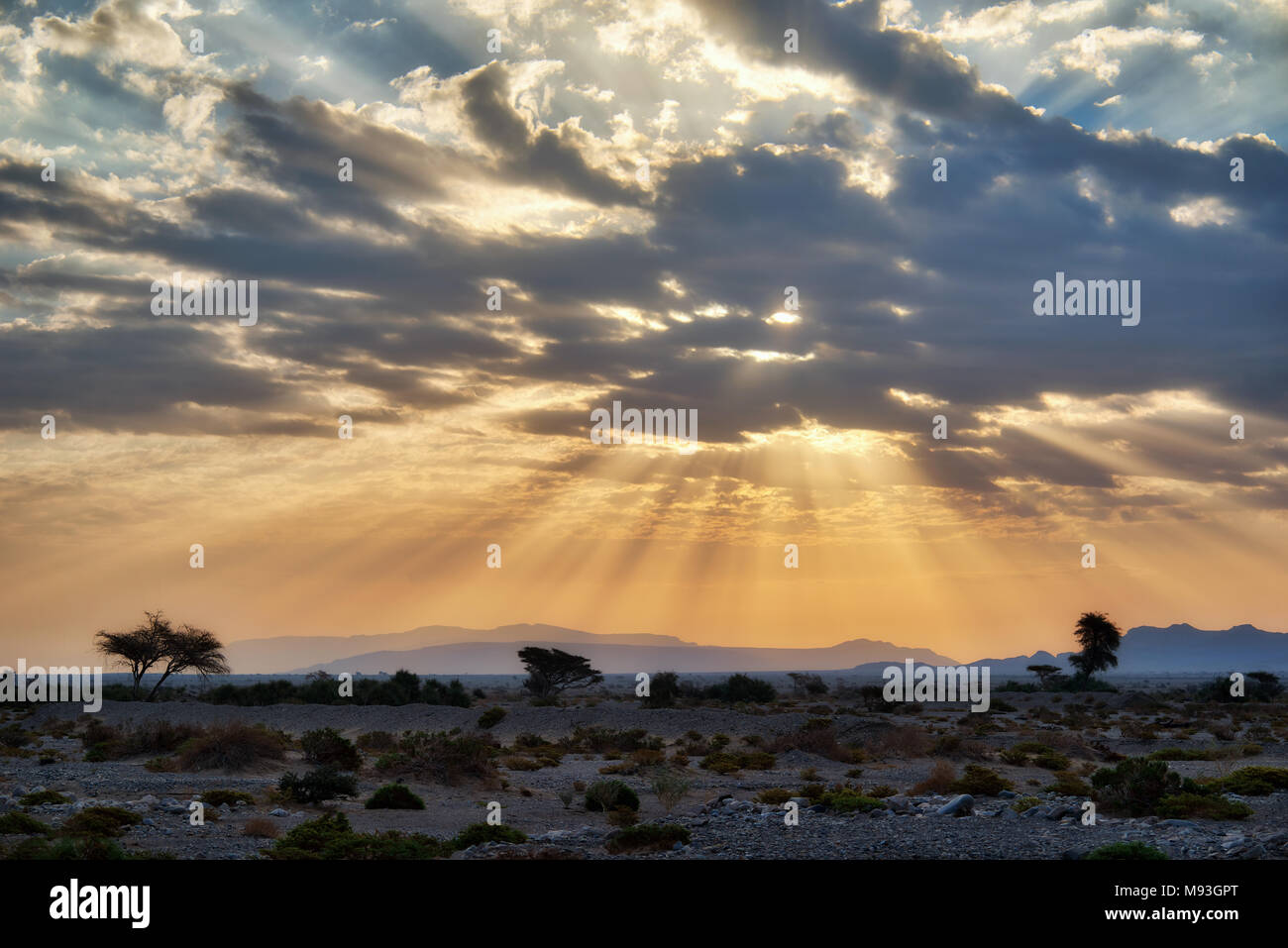 Sun Breaking though the Clouds in Oman taken in 2015 Stock Photo
