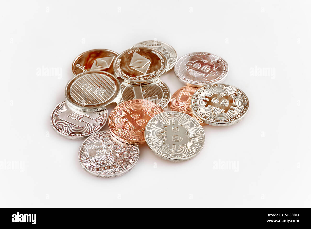 Physical cryptocurrency, Bitcoin, Ethereum, Litecoin, Dash and a random  pile of coins on white background Stock Photo - Alamy