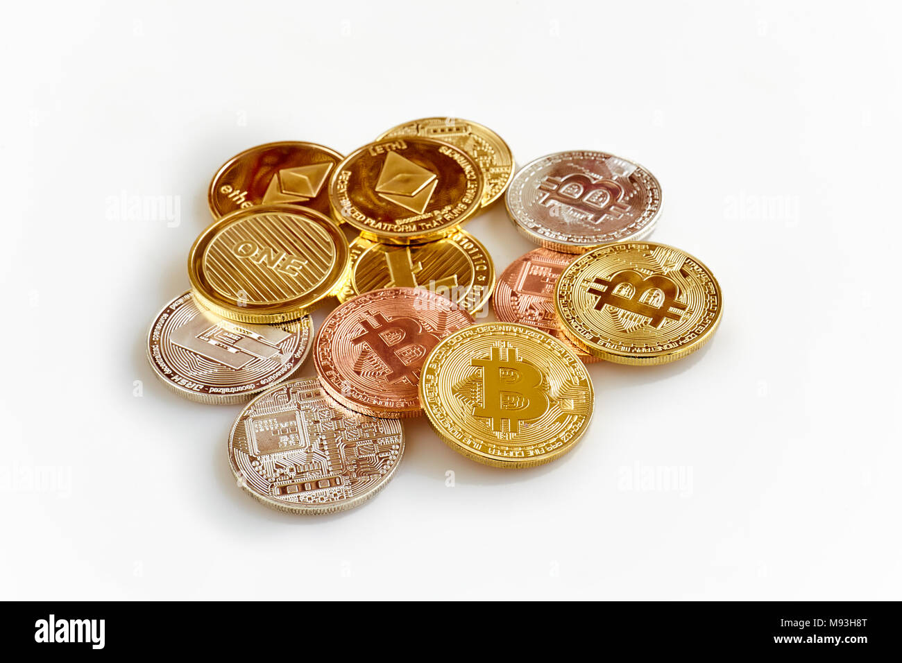Physical cryptocurrency, Bitcoin, Ethereum, Litecoin, Dash and a random  pile of coins on white background Stock Photo - Alamy