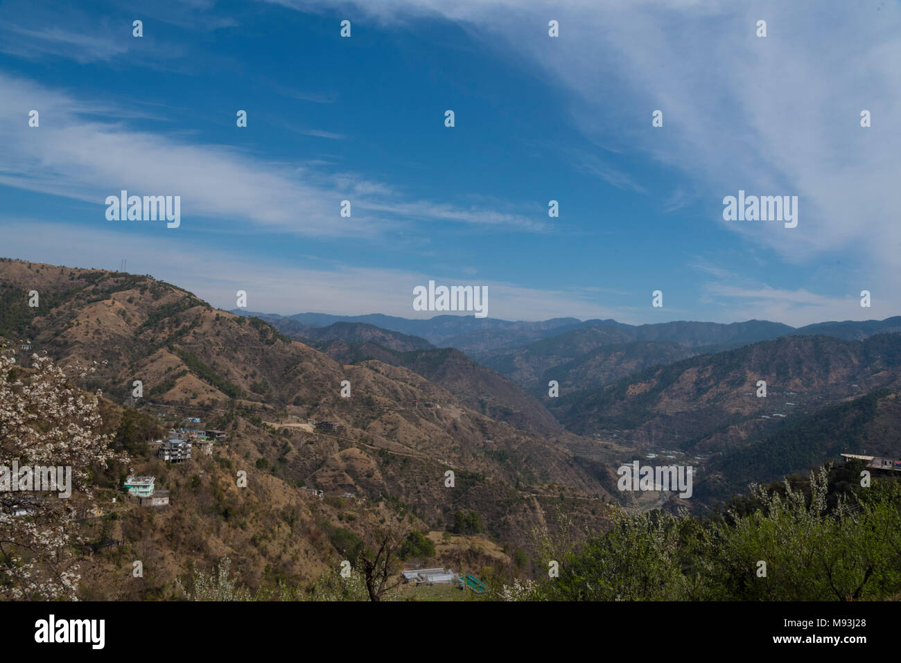 Scenic beautiful mountain landscape valley and town nature with blue ...