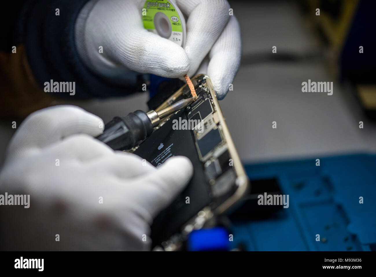 Reparing electronics devices, chips, motherboards, welding Stock Photo