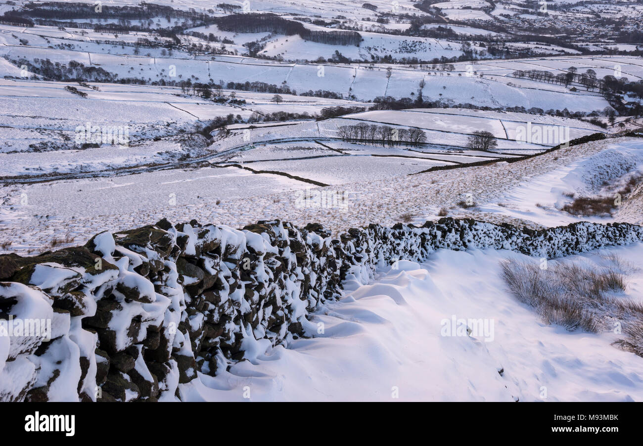 Snowdrifts on hills above Chapel-en-le-frith in the Peak District national park, Derbyshire, England. Stock Photo