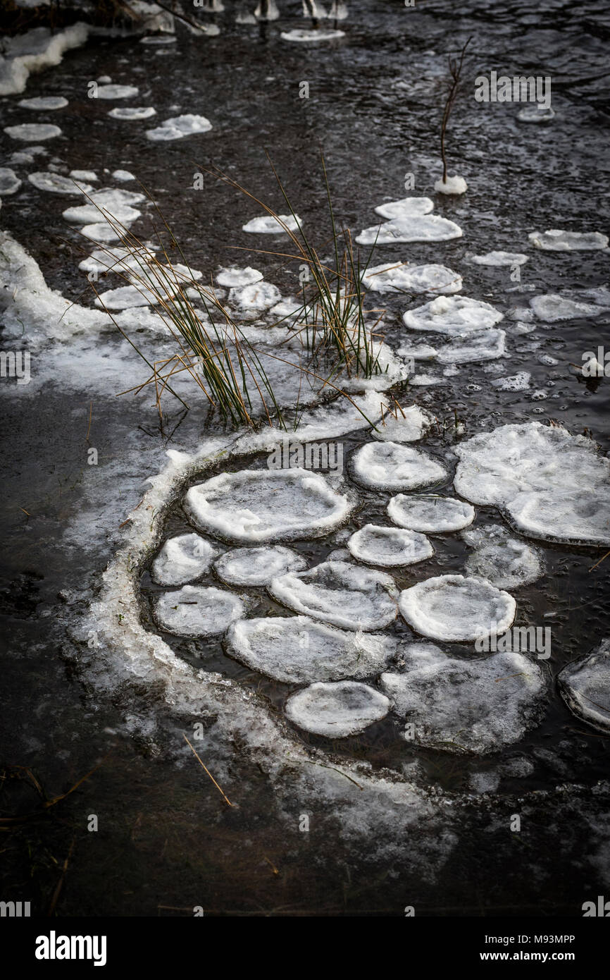 Ice Patterns on Loch Pityoulish in the Cairngorms National Park of Scotland. Stock Photo