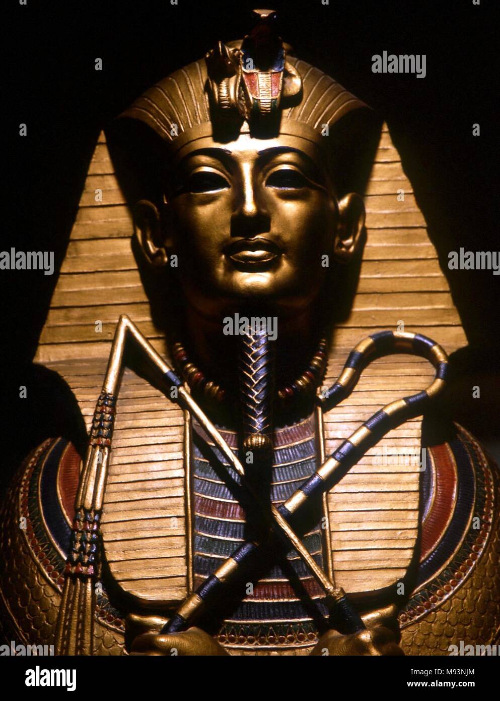 EGYPTIAN MYTHOLOGY. TUTANKHAMUN.  Gold mummy-mask of the young pharaoh, Tutankhamun, of the late 18th dynasty, discovered in 1922 by Carter. Facsimile in the Egyptian Museum, San Jose Stock Photo
