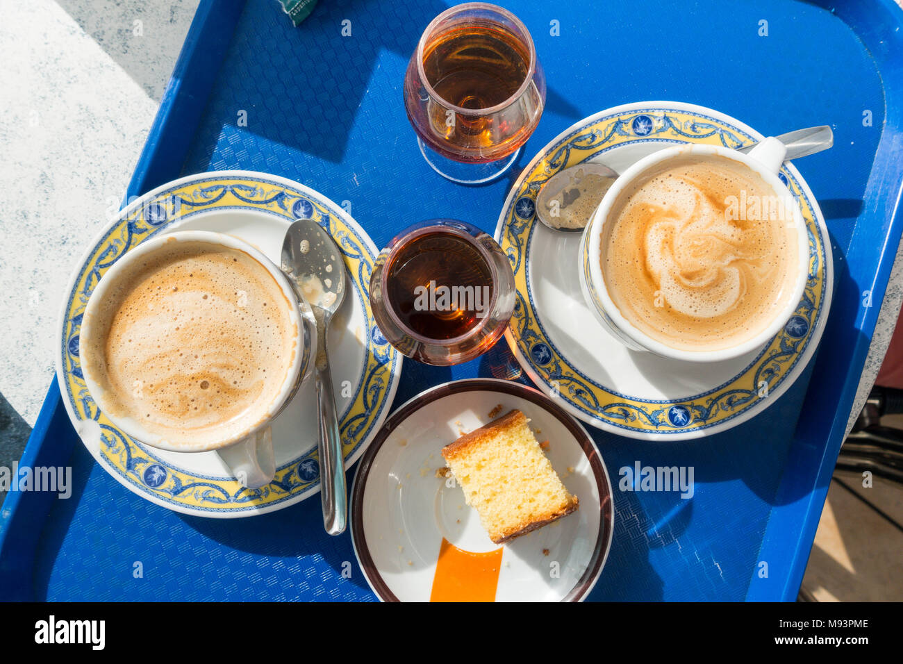 Traditional coffee, Brandy and cake for breakfast in Benidorm, Spain
