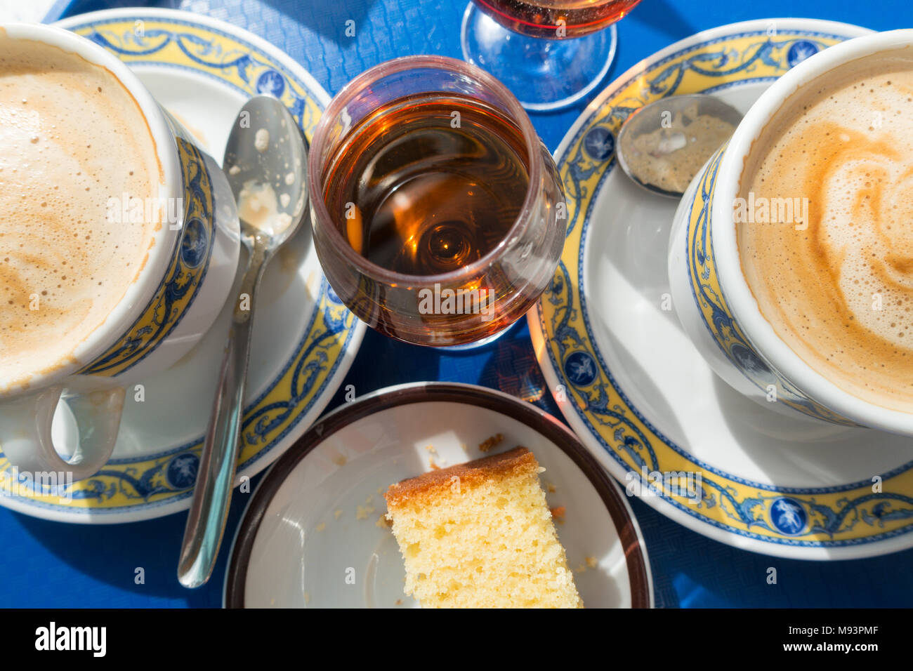 Traditional coffee, Brandy and cake for breakfast in Benidorm, Spain