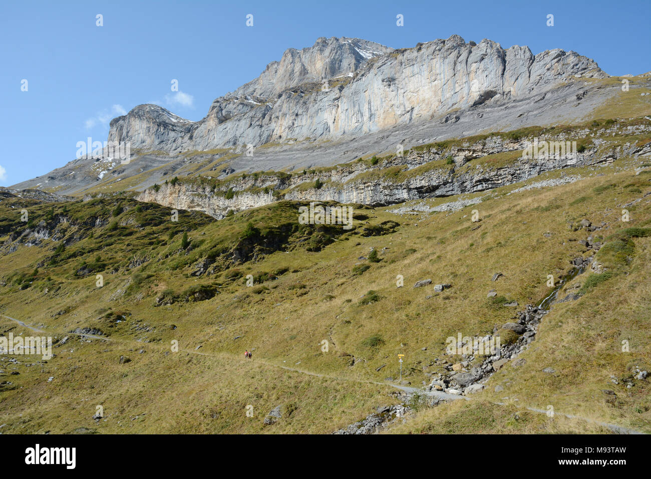 The Bernese-Oberland hiking route through the Gemmi Pass in the Bernese Alps near the Swiss alpine resort town of Leukerbad, Valais, Switzerland. Stock Photo