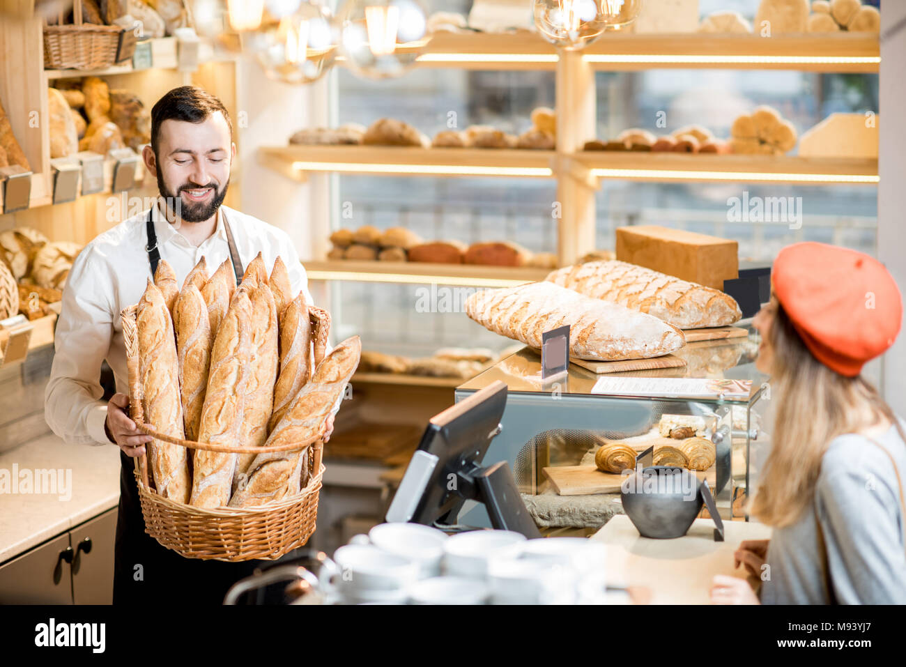 https://c8.alamy.com/comp/M93YJ7/seller-in-the-bread-store-M93YJ7.jpg