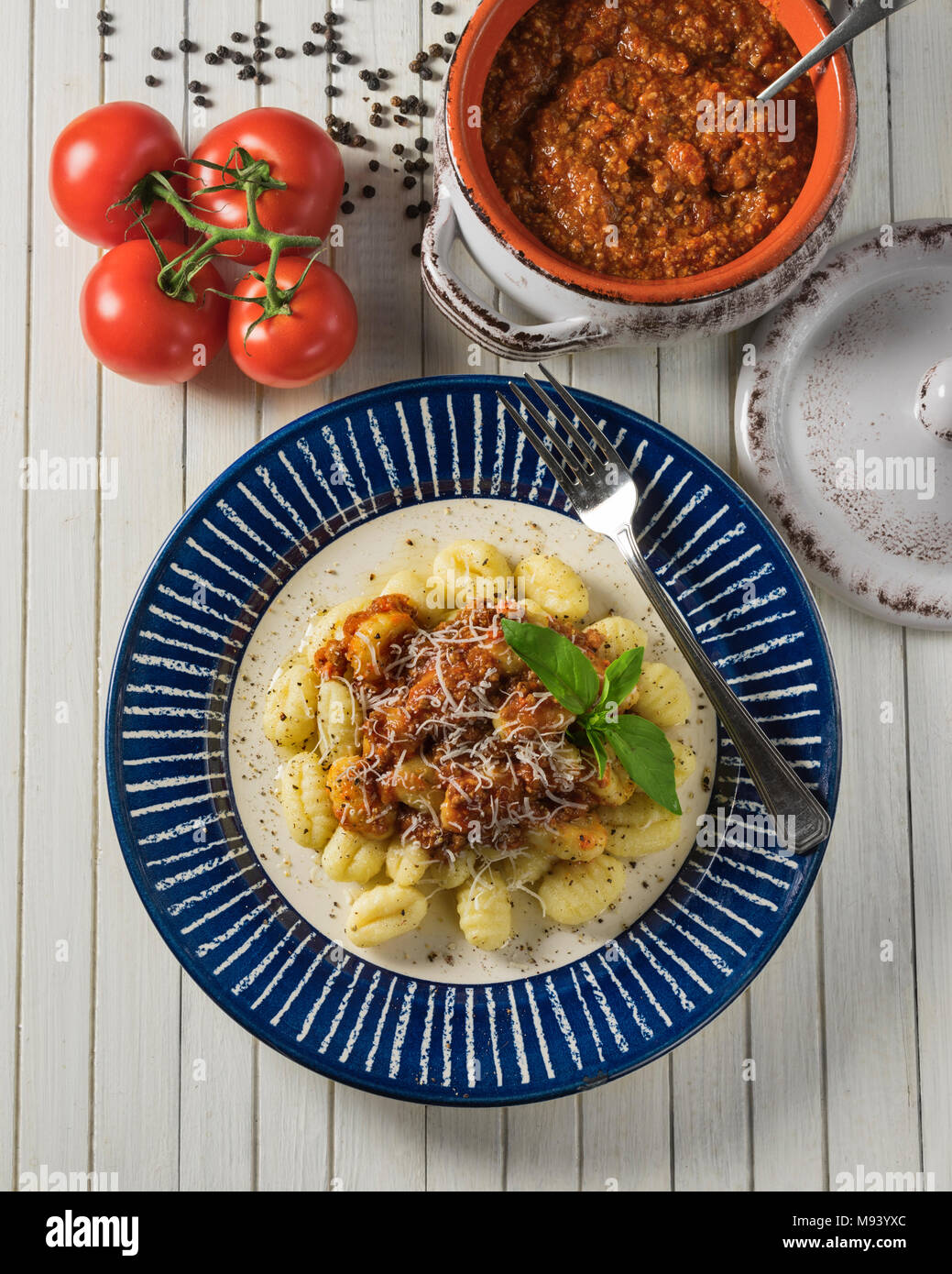 Gnocchi ragù. Italian potato dumplings with bolognese sauce. Italy Food Stock Photo