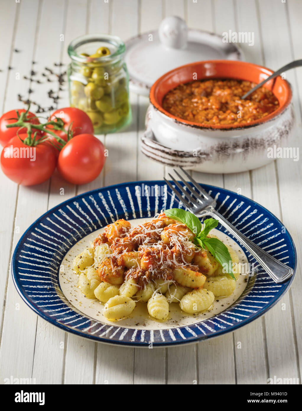 Gnocchi ragù. Italian potato dumplings with bolognese sauce. Italy Food Stock Photo