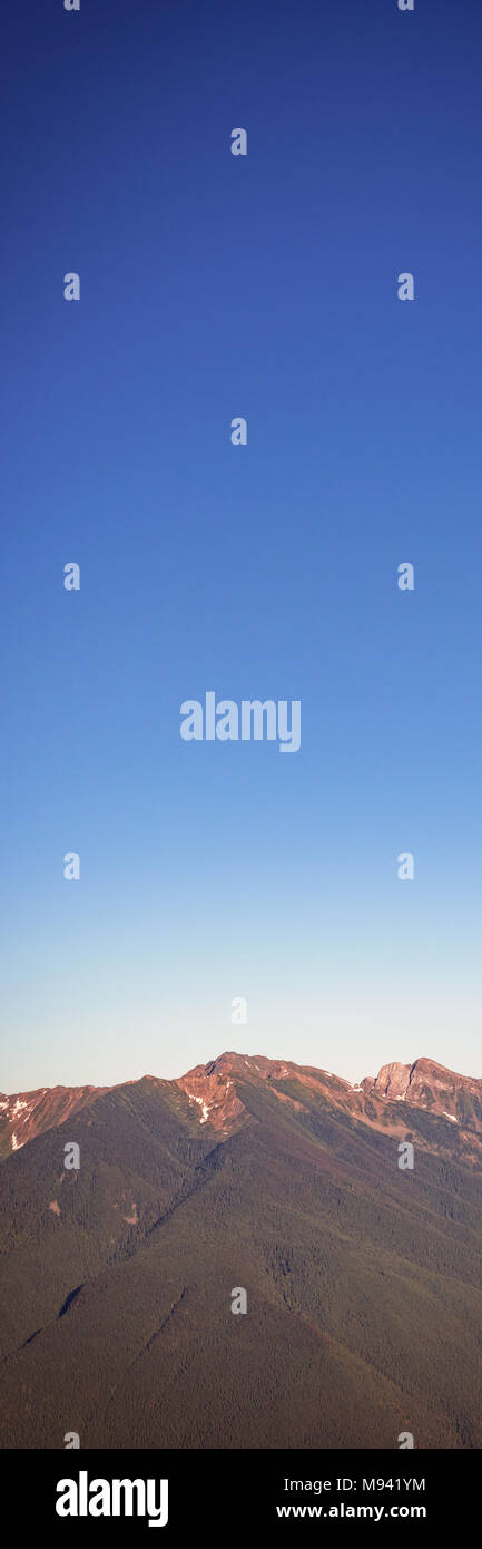 Clouds passing over a mountain range Stock Photo - Alamy