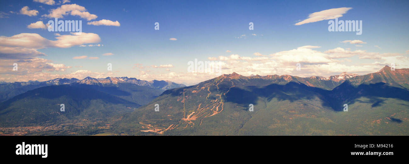 Rocky mountains covered dense forest hi-res stock photography and ...