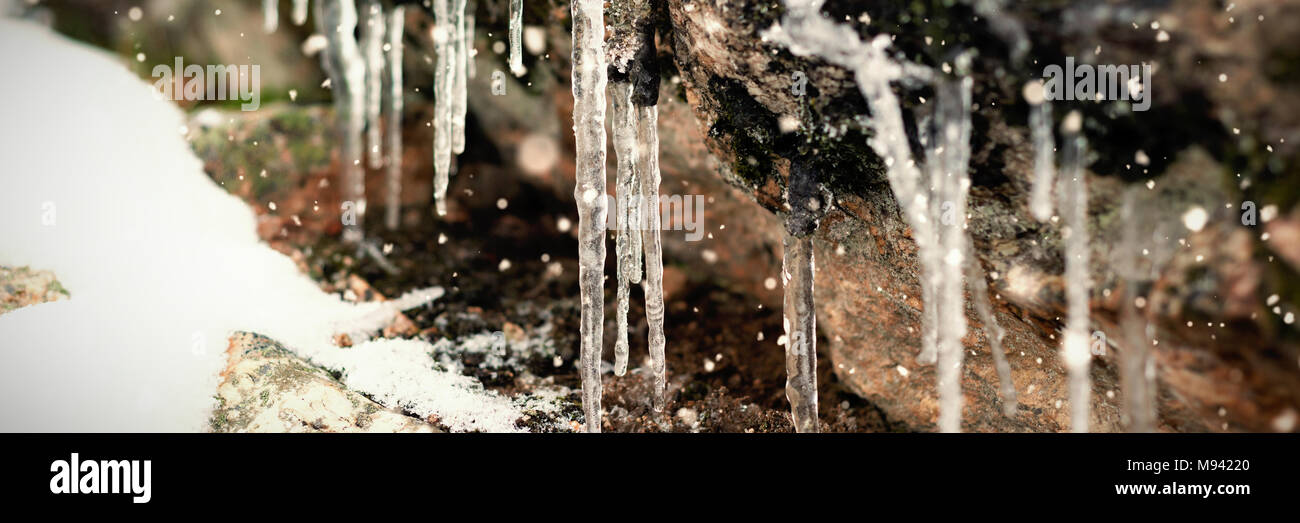 Composite image of snow falling Stock Photo