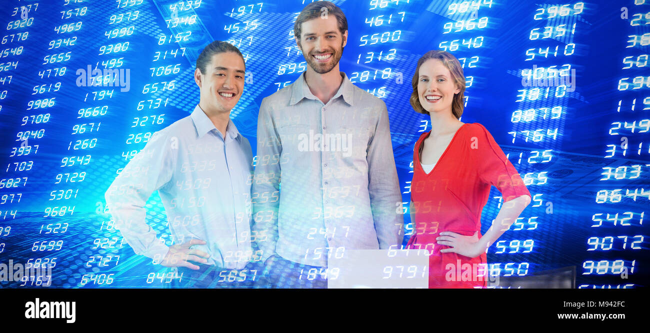 Composite image of portrait of coworkers standing at table Stock Photo