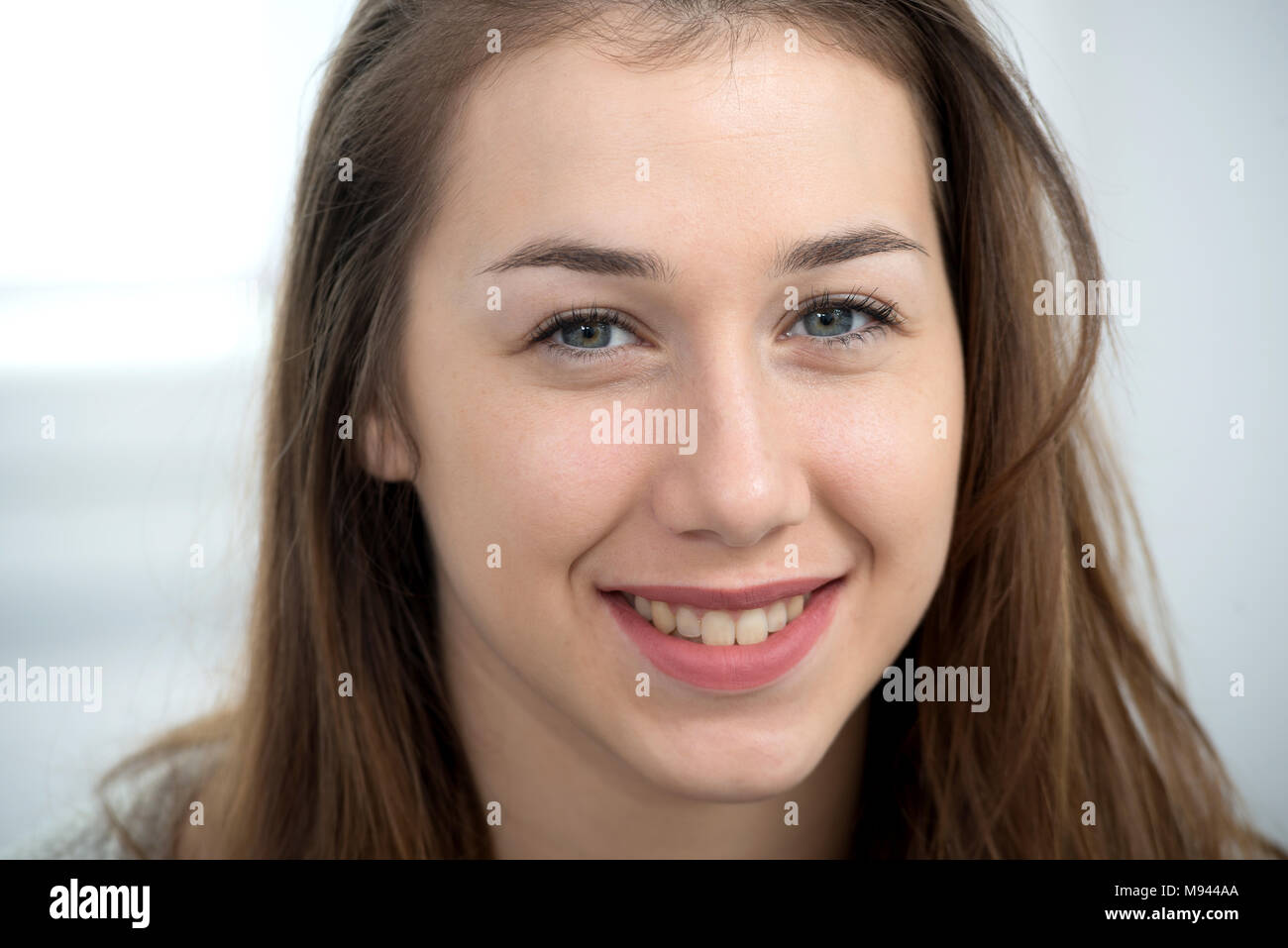 portrait of a beautiful young woman with long hair Stock Photo - Alamy