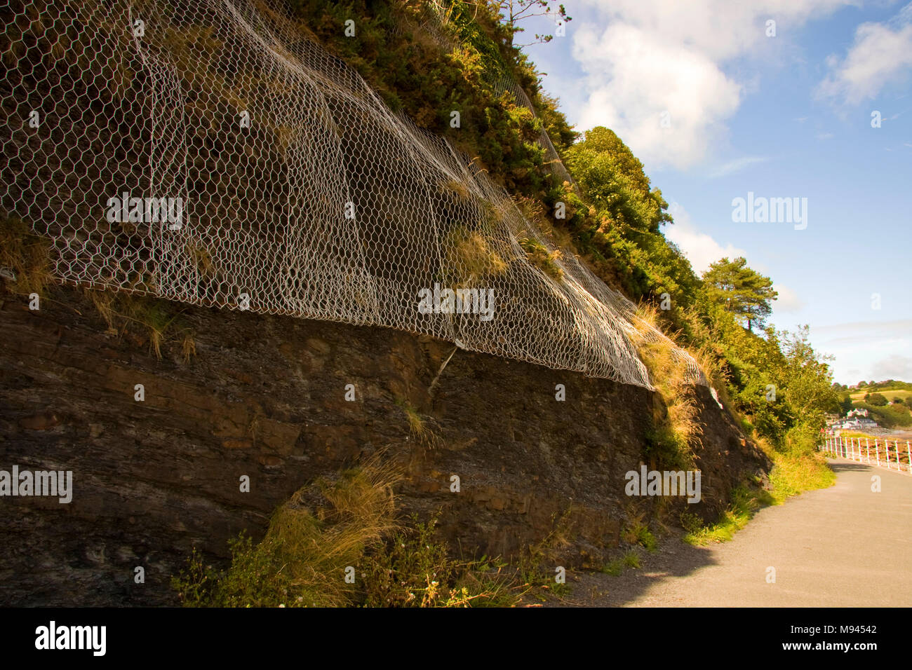 Rockfall protection barrier Wisemans Bridge Wales Stock Photo