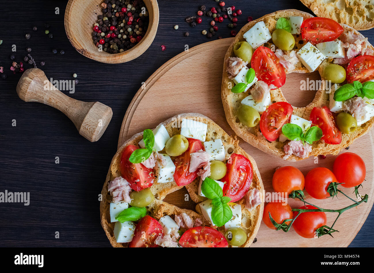 Italian Appetizer Friselle Italian Dried Bread Friselle With Tomatoes Cherry Cheese Mozzarella Olives Tuna Basil And Pepper In Wooden Pounder It Stock Photo Alamy Italian Appetizer Friselle Italian Dried Bread Friselle With Tomatoes Cherry Cheese Mozzarella Olives Tuna Basil And Pepper In Wooden Pounder It Stock Photo Alamy