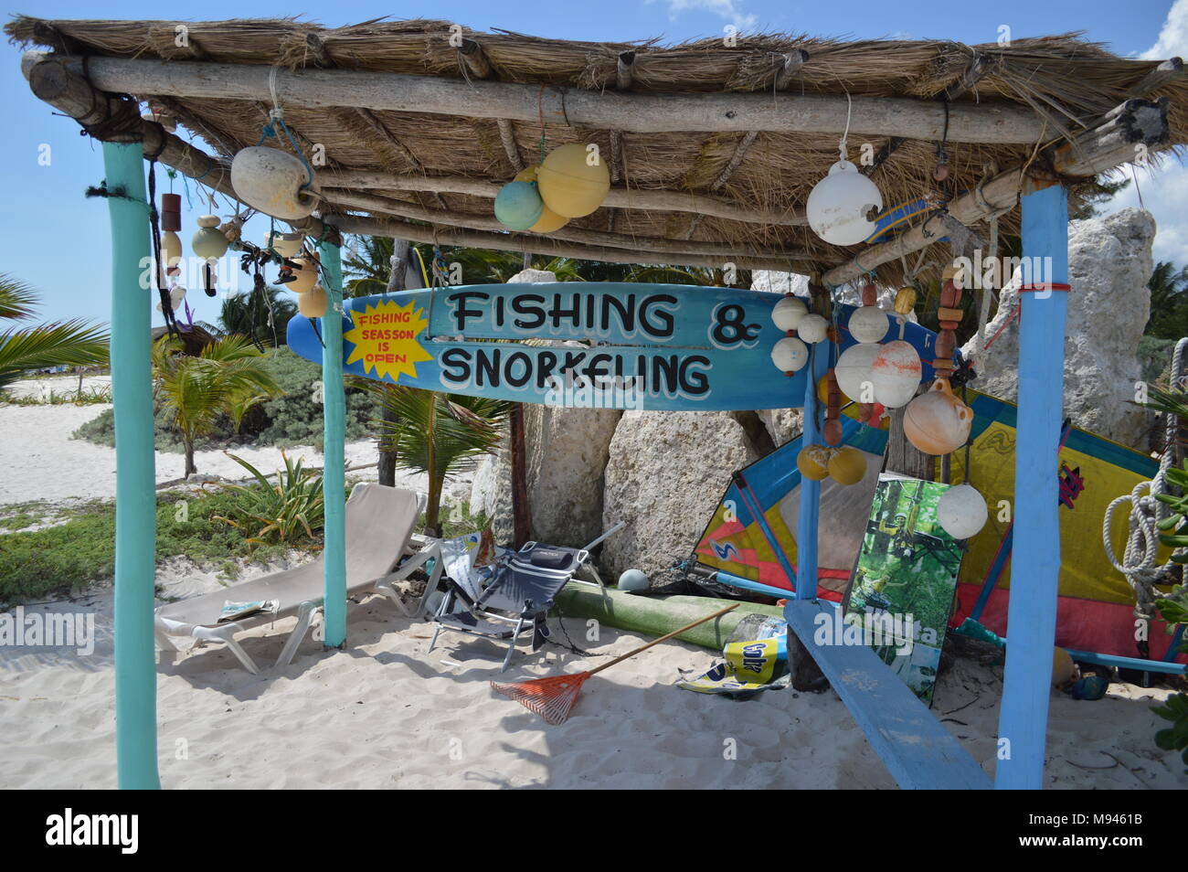 An advert for fishing and snorkeling at a Playa del Carmen beach, Mexico Stock Photo