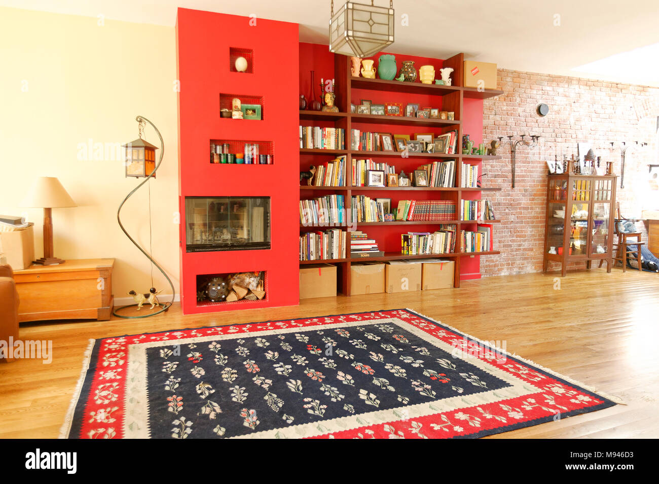 Interior of loft style house with red and yellow coloring Stock Photo