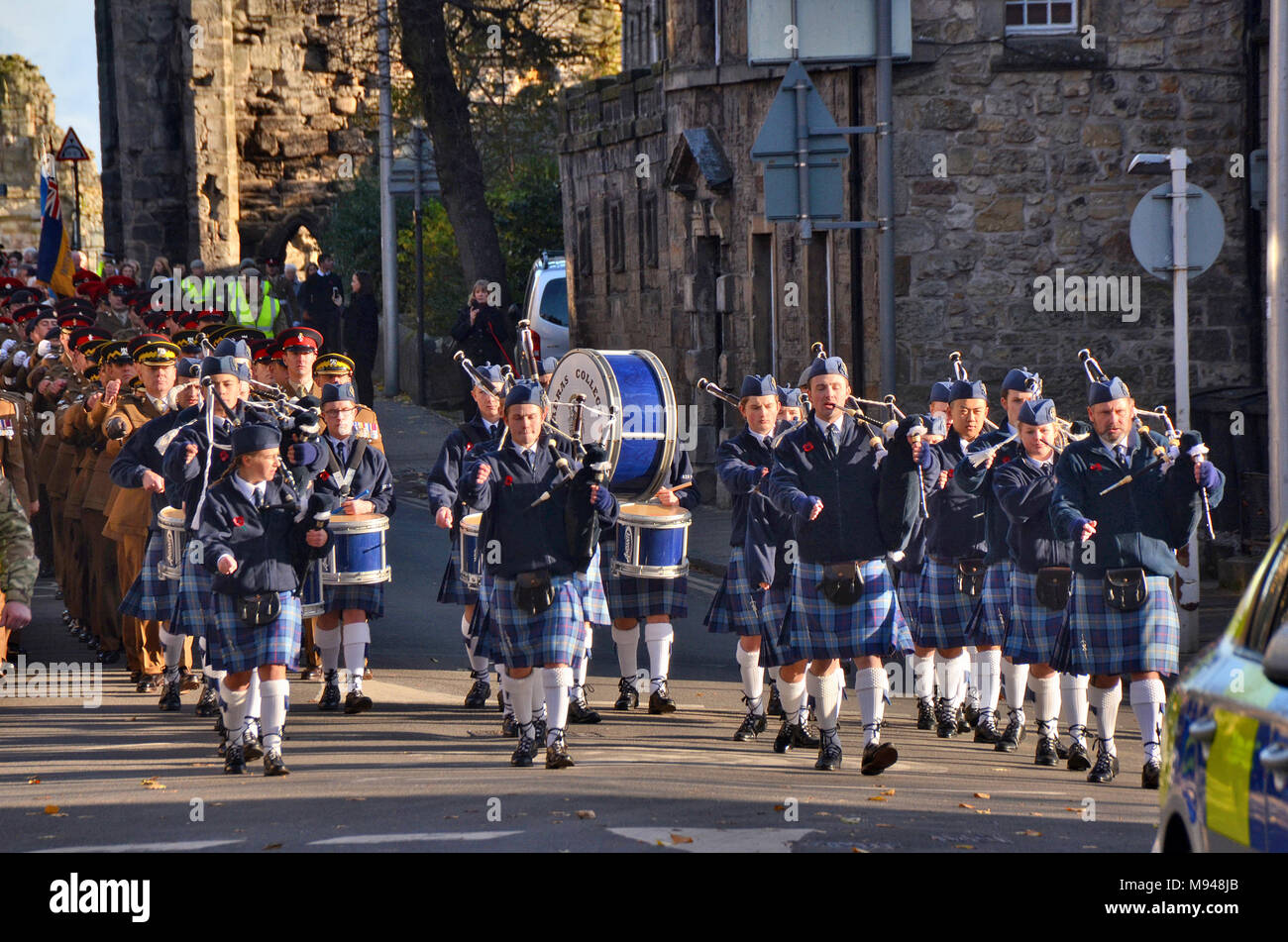 Representatives of the Madras School / college bagpipe band of St Andrews at a remembrance day parade in St Andrews Fife Stock Photo