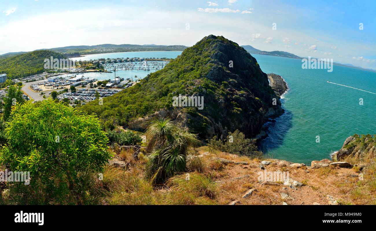 View over northern section of Double Heads volcanic outcrop protecting Rosslyn Bay Marina in Rosslyn, Queensland, Australia. Stock Photo