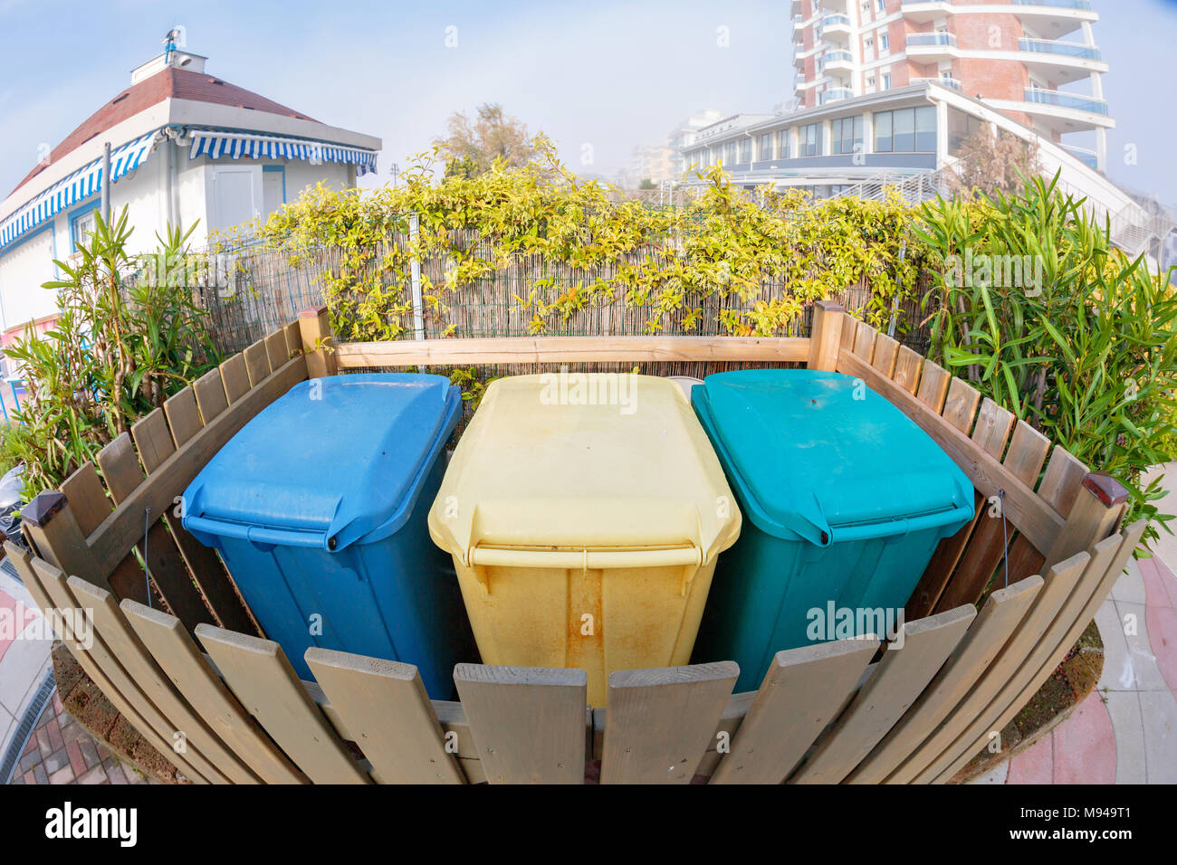 Three types of waste separation tanks on the beach in Italy. Hazardous