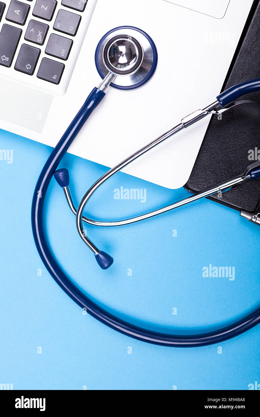 Stethoscope lying on a modern laptop Stock Photo - Alamy