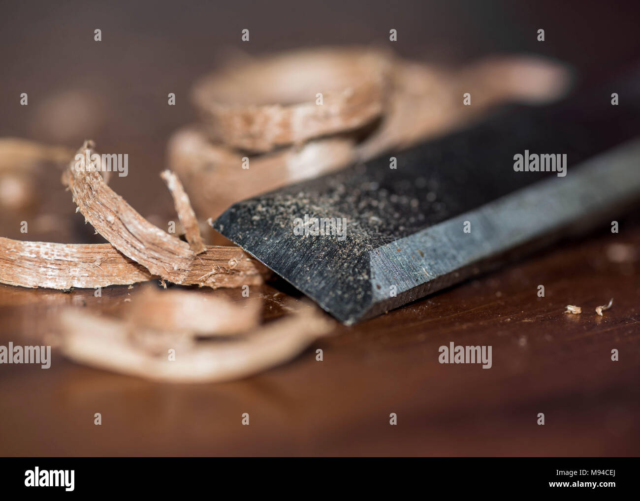 woodworking chisel and wood shavings Stock Photo