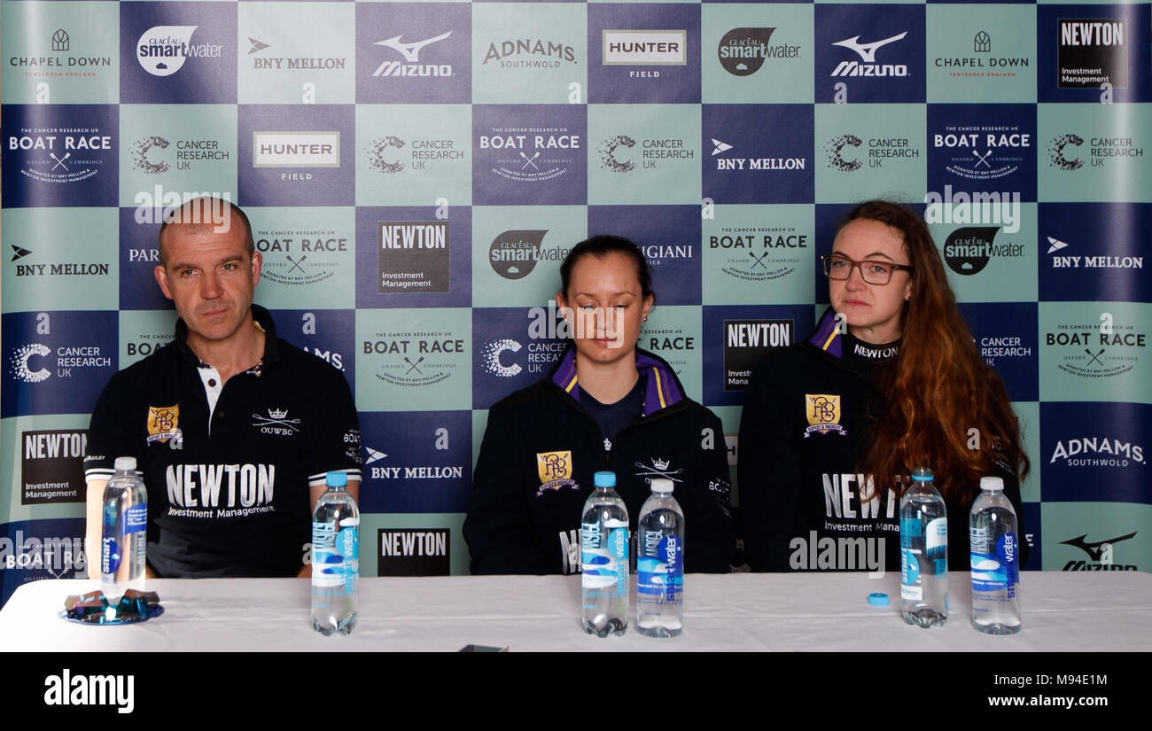 Oxford University's women's blue boat coach Adam Nelder (left), Cox Jessica Buck and President Katherine Erickson (right) during a press conference at the Thames Rowing Club, London. Stock Photo