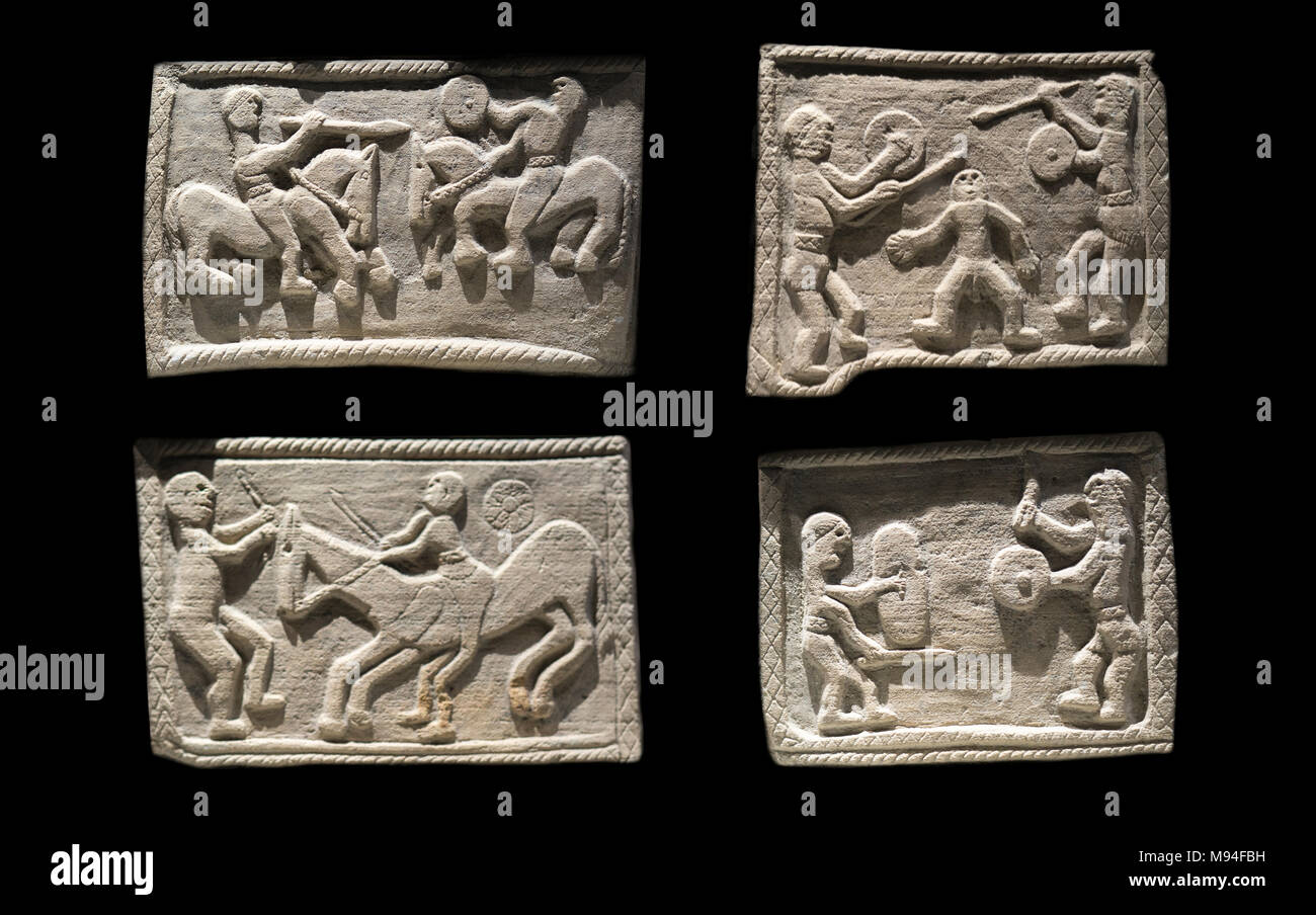 Jaen, Spain - December 29th, 2017: Warrior box from Necropolis of Piquia, Arjona, Jaen. Four scenes of each box side. Iberian Museum of Jaen Stock Photo