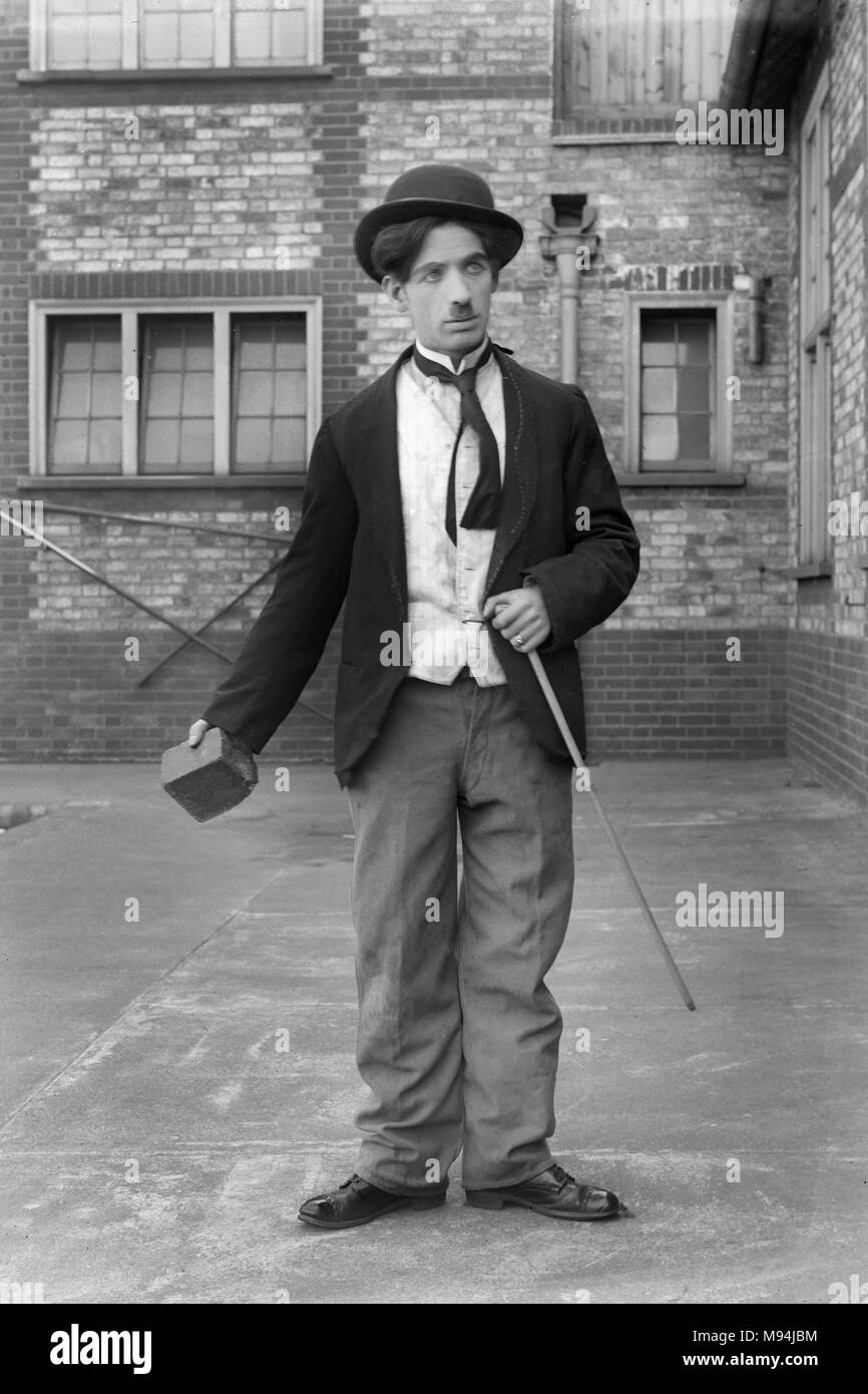 Charlie Chaplin impersonator in England, ca. 1925. Stock Photo