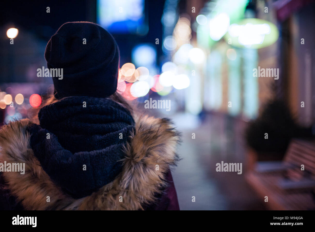 Girl walking at night rear view hi-res stock photography and images - Alamy