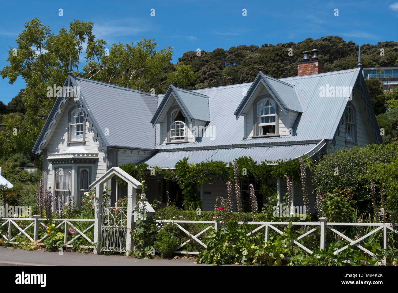 pretty old Victorian houses Akaroa South Island New Zealand Stock Photo