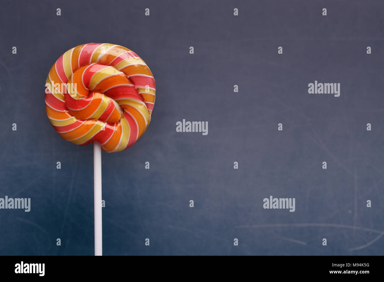 Birthday background with candy lollipop Stock Photo - Alamy