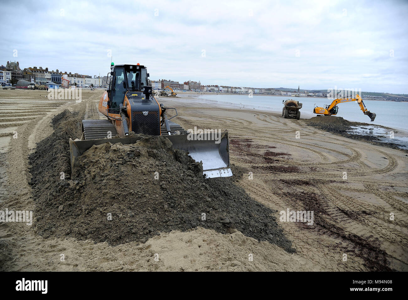 Works to repair Weymouth Beach ahead of summer season, Dorset, UK Credit: Finnbarr Webster/Alamy Live News Stock Photo