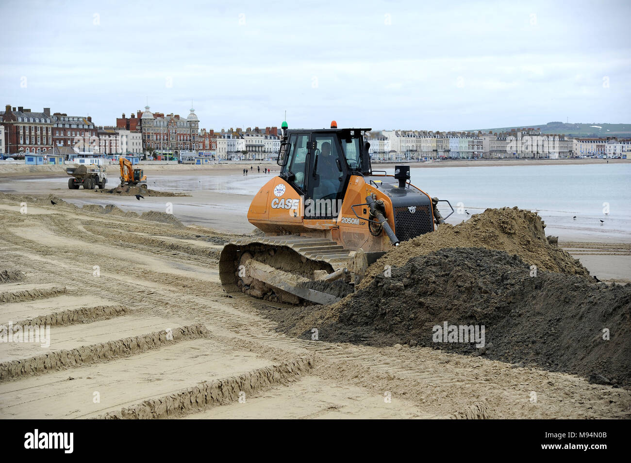 Works to repair Weymouth Beach ahead of summer season, Dorset, UK Credit: Finnbarr Webster/Alamy Live News Stock Photo