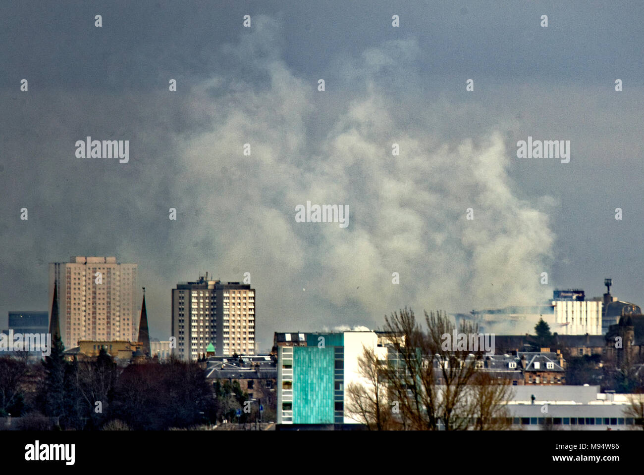 Glasgow, Scotland, UK  22nd March. The city centre is engulfed in reported asbestos filled smoke as a  massive blaze in sauchiehalll street in the heart of the city seen from seven miles away. Credit: Gerard Ferry/Alamy news Stock Photo