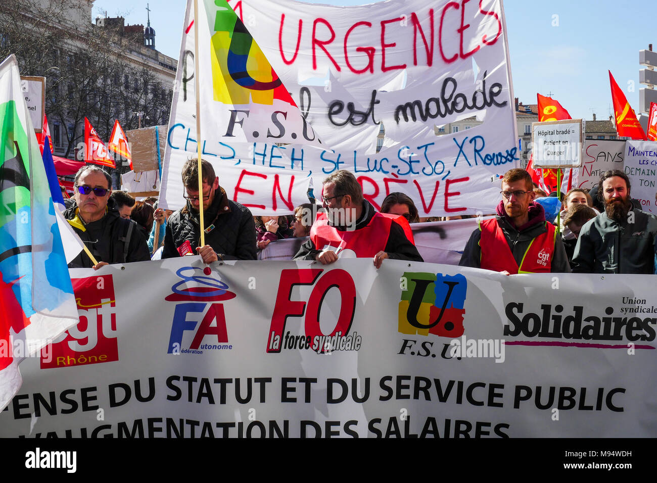 Lyon, France, 22nd March 2018: Called by trade unions and left wing parties, protesters including school and hospital staff, civil servants, rail workers, students and collegians, are seen in Lyon (Central-Eastern France) on March 22, 2018, as they take part in a demonstration held against French government's string of reforms.  In Lyon, the number of the demonstrators was estimated to more or less 10 000 people, according to the Police. Credit: Serge Mouraret/Alamy Live News Stock Photo