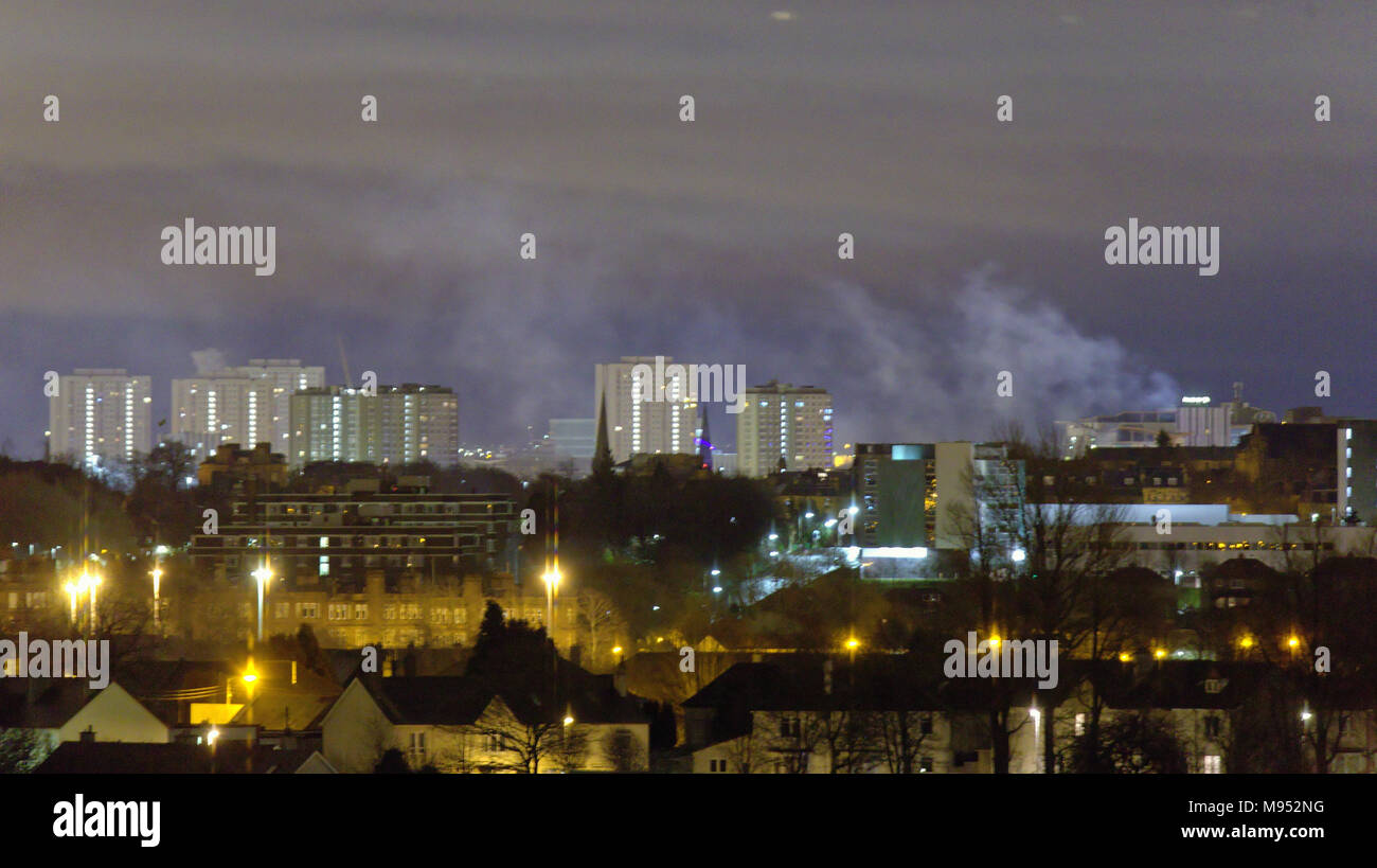 Glasgow, Scotland, UK  23rd March. City centre covered in pollutant smoke reported as being asbestos contaminated 18 hours on Sauchiehall street fire still covering the city in pollutant smoke viewed fron 7 miles away. Credit: Gerard Ferry/Alamy news Stock Photo