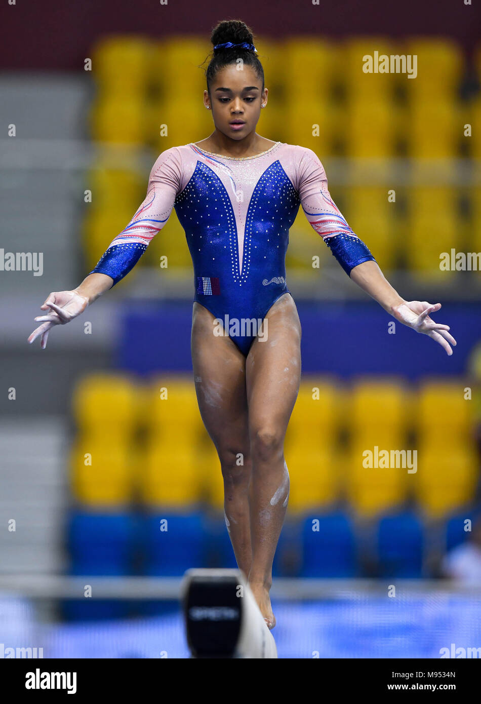 Doha, Capital of Qatar. 22nd Mar, 2018. Melanie De Jesus Dos Santos of France competes during the women's Balance Beam qualifying round of the 11th FIG Artistic Gymnastics World Cup in Doha, Capital of Qatar, on March 22, 2018. Credit: Nikku/Xinhua/Alamy Live News Stock Photo