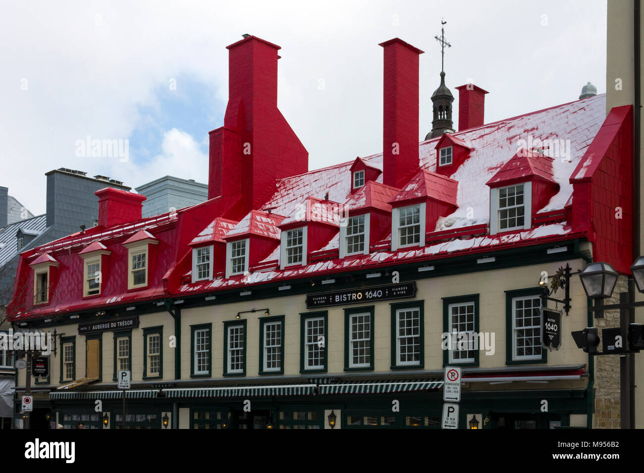 Bistro 1640, example of French architecture, with elaborate red roof in Quebec City, Quebec, Canada Stock Photo