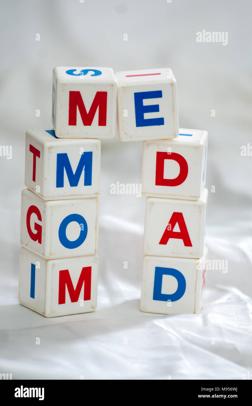 qubes spelling mom dad and me Stock Photo