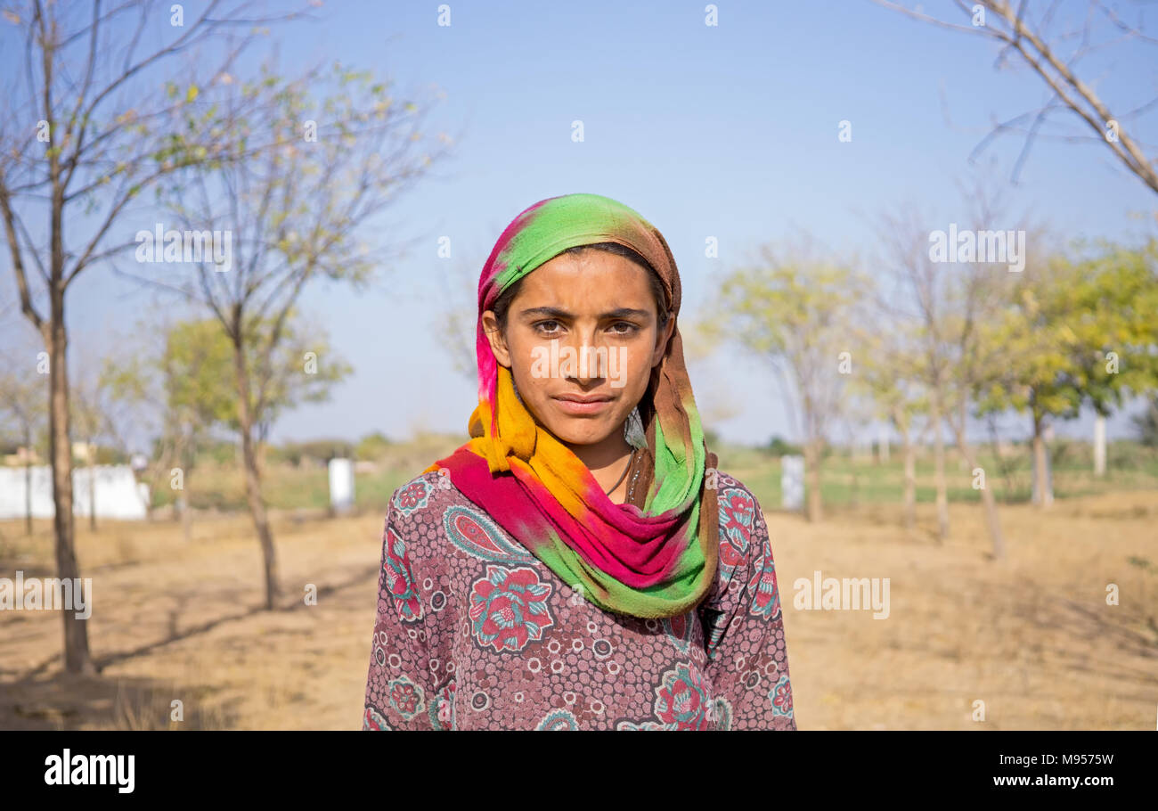 Khara Rajasthan, India - February 25, 2018: Portrait of a young Indian girl with headscarf. Stock Photo