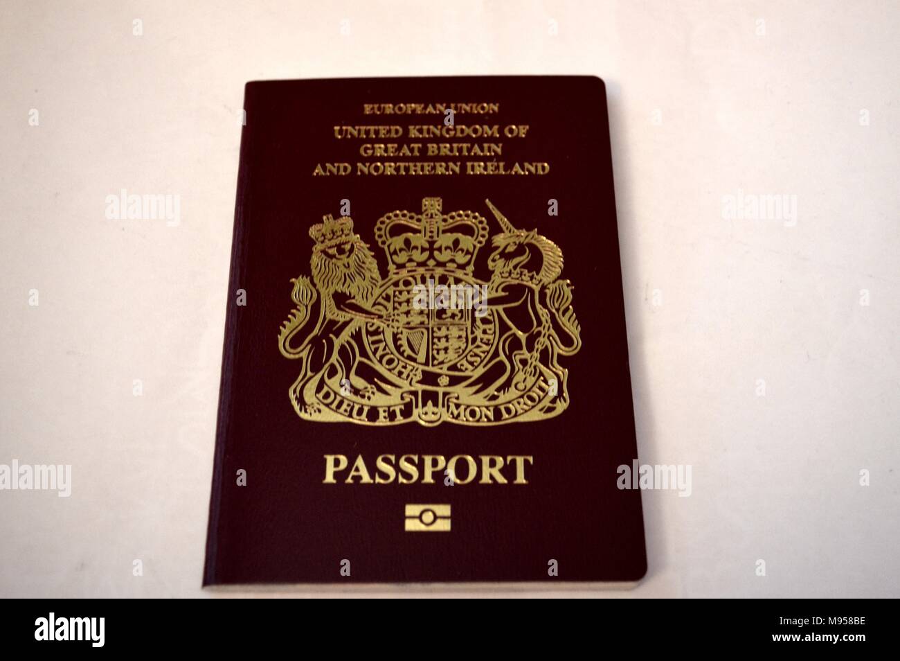 A Red British European Passport on a isolated white background,used for travel and identification Stock Photo