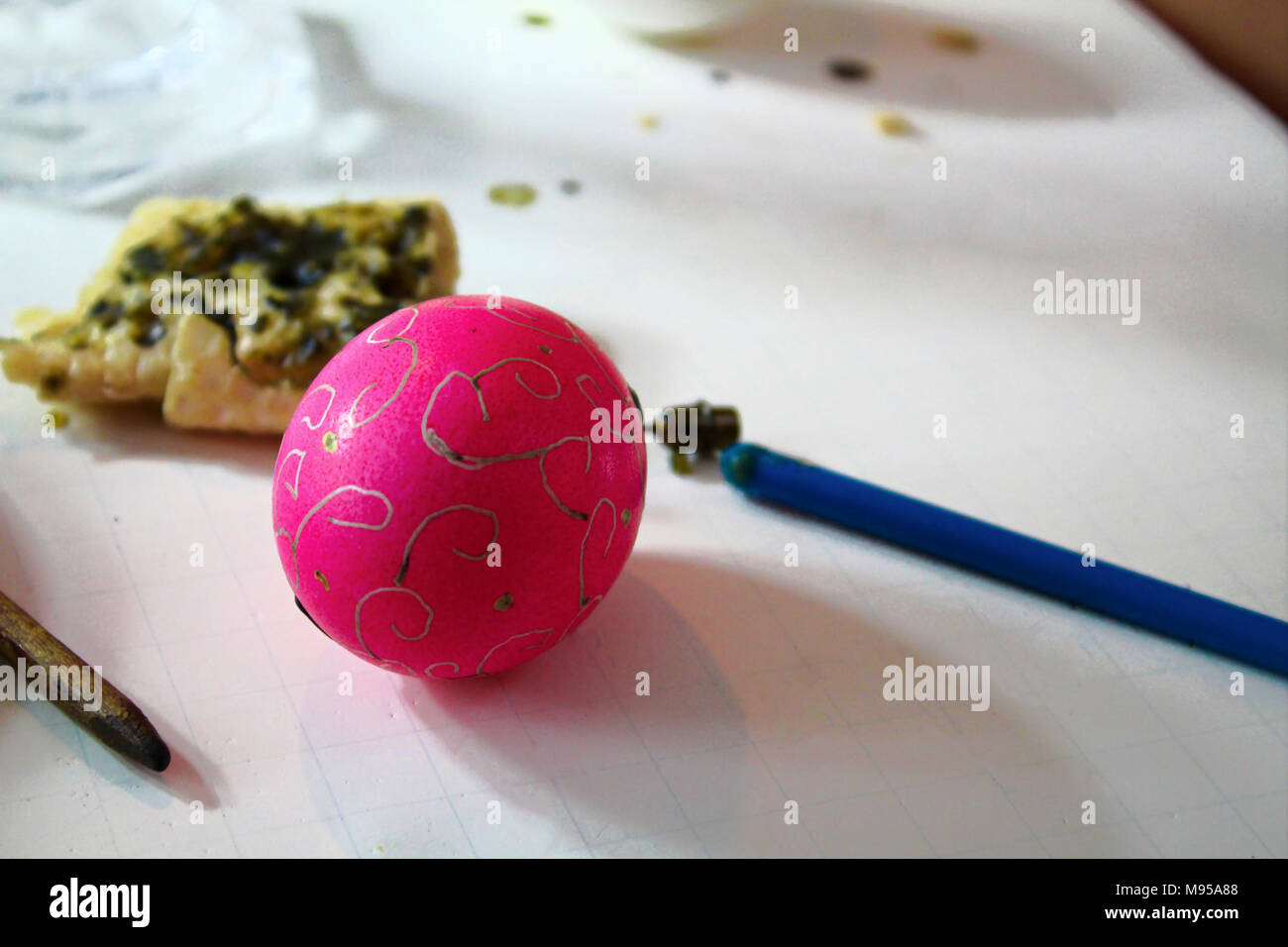 Decorating easter eggs with beeswax and a stylus. Stock Photo