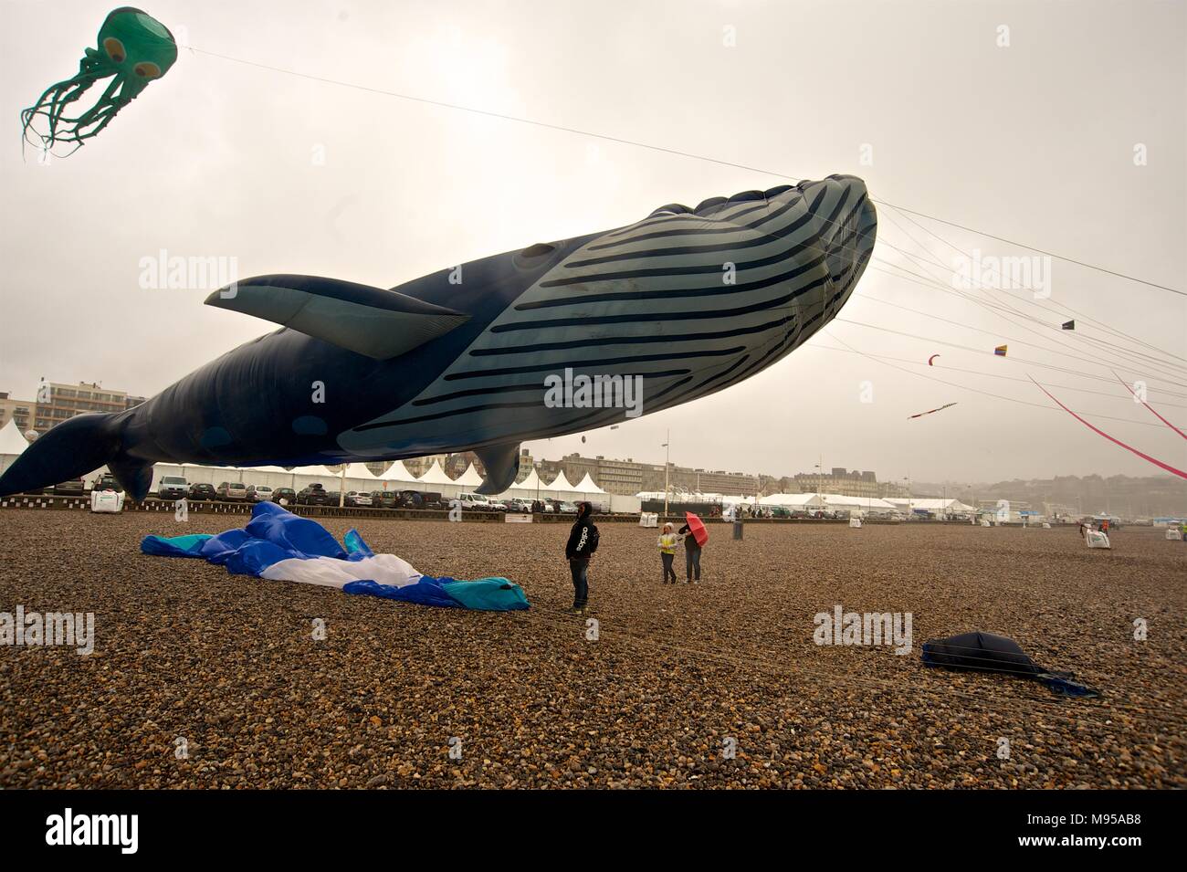 Dieppe International Kite Festival showing artists and kites at the annual  festival held on the beach Stock Photo - Alamy