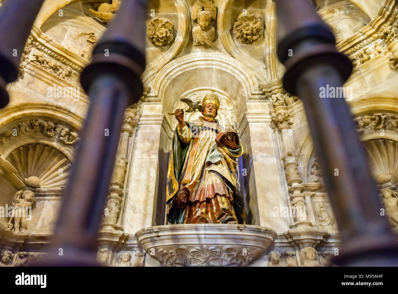 Gothic sculpture in side chapel of the Seville Cathedral (Catedral de Santa María de la Sede) in Seville, Andalusia, Spain Stock Photo