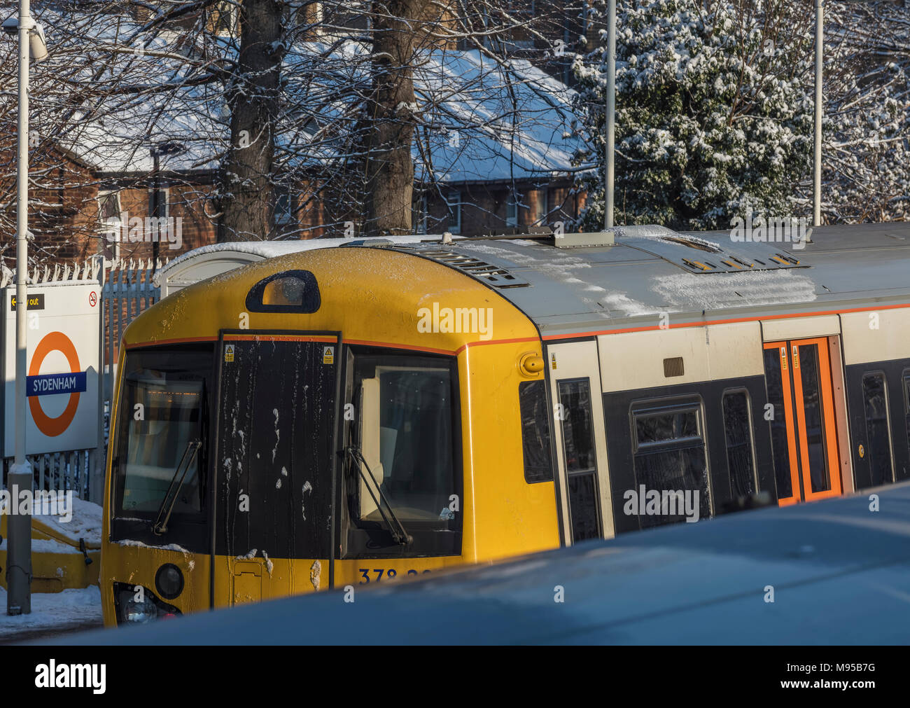 Train at Sydenham Station in South London in the Snow Stock Photo